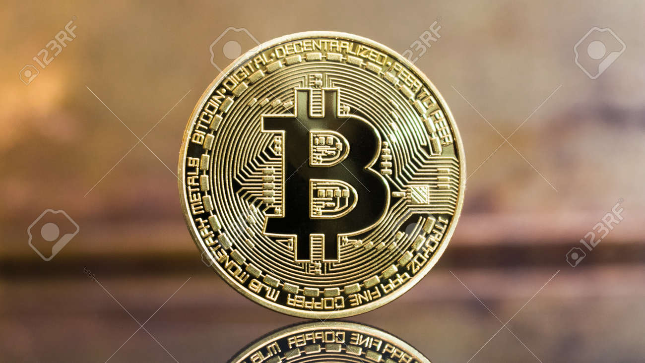 Isolated Physica!   l Bitcoin Currency With Golden Background - 